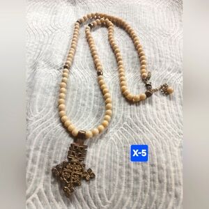 Beige Beaded Ethiopian Rosary Necklace with Ornate Copper Cross Pendant